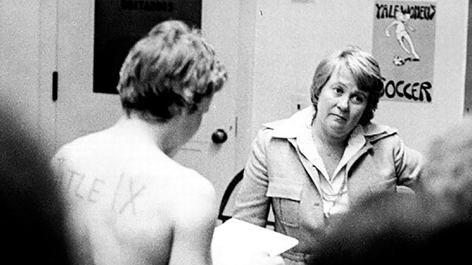 Members of the 1976 Yale crew team disrobe with "Title IX" written on their bodies and confront Athletic Director Joni Barnett's office on March 3, 1976.